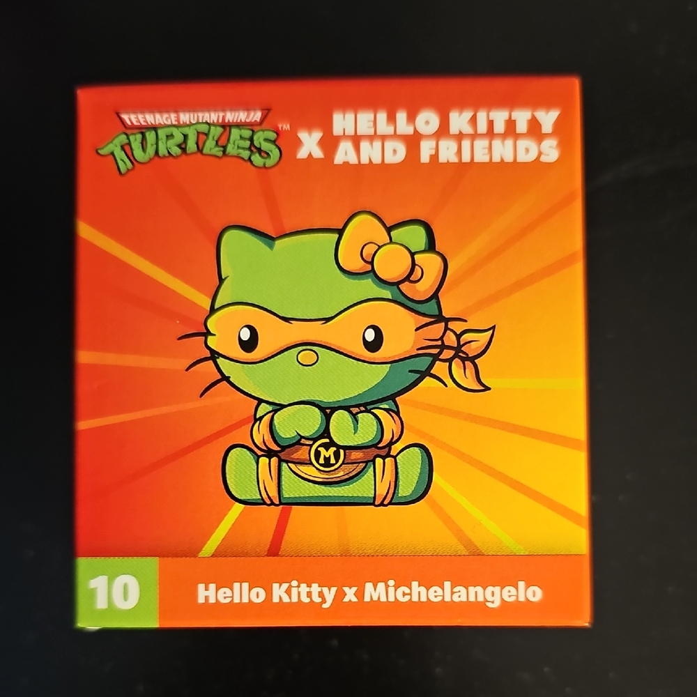 McDonald's Hello Kitty x Michelangelo Action Figure - Orange and Green